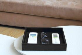 HofferRuffer black vanity tray saves counter space on a busy surface