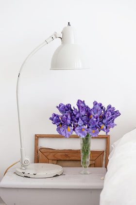 Hollyone iris arrangement adds color and texture to weddings and home tables