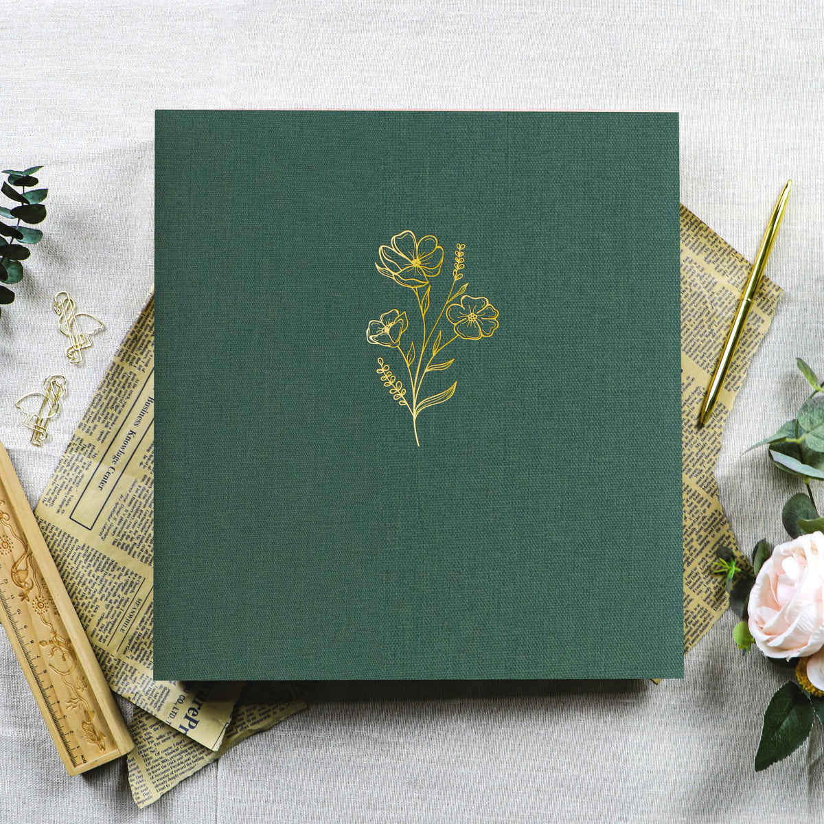 Holoary linen-cover texture highlighted by hot-stamped flower design.