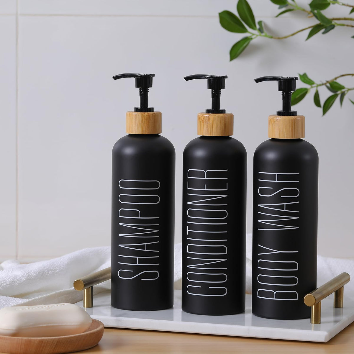 HOMCDALY pump-action shampoo dispenser bottle in black for easy, mess-free use.