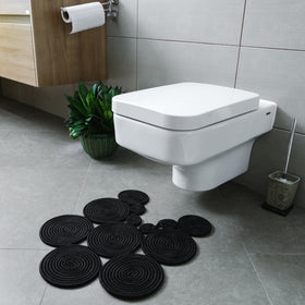 Home Turko boho jute bath mat close-up texture enhances rustic bathroom charm.