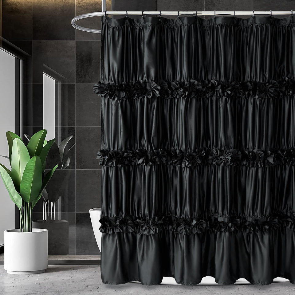 Homechoice Decor black ruffle shower curtain adds vintage charm and privacy to the master bathroom.