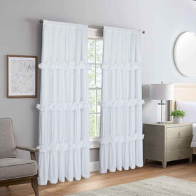 Homechoice Decor boho-chic ruched curtains add romantic texture.
