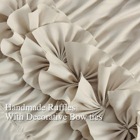 Homechoice Decor rod pocket drapes in camel add easy installation and timeless warmth.