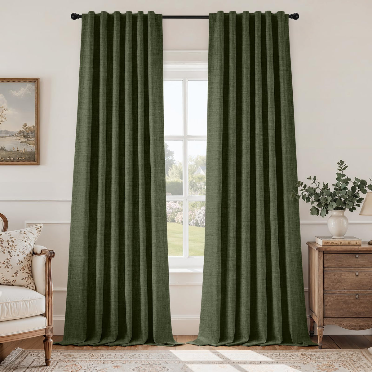 HOMEIDEAS blackout curtain in olive-green blocks light for daytime movie marathons.
