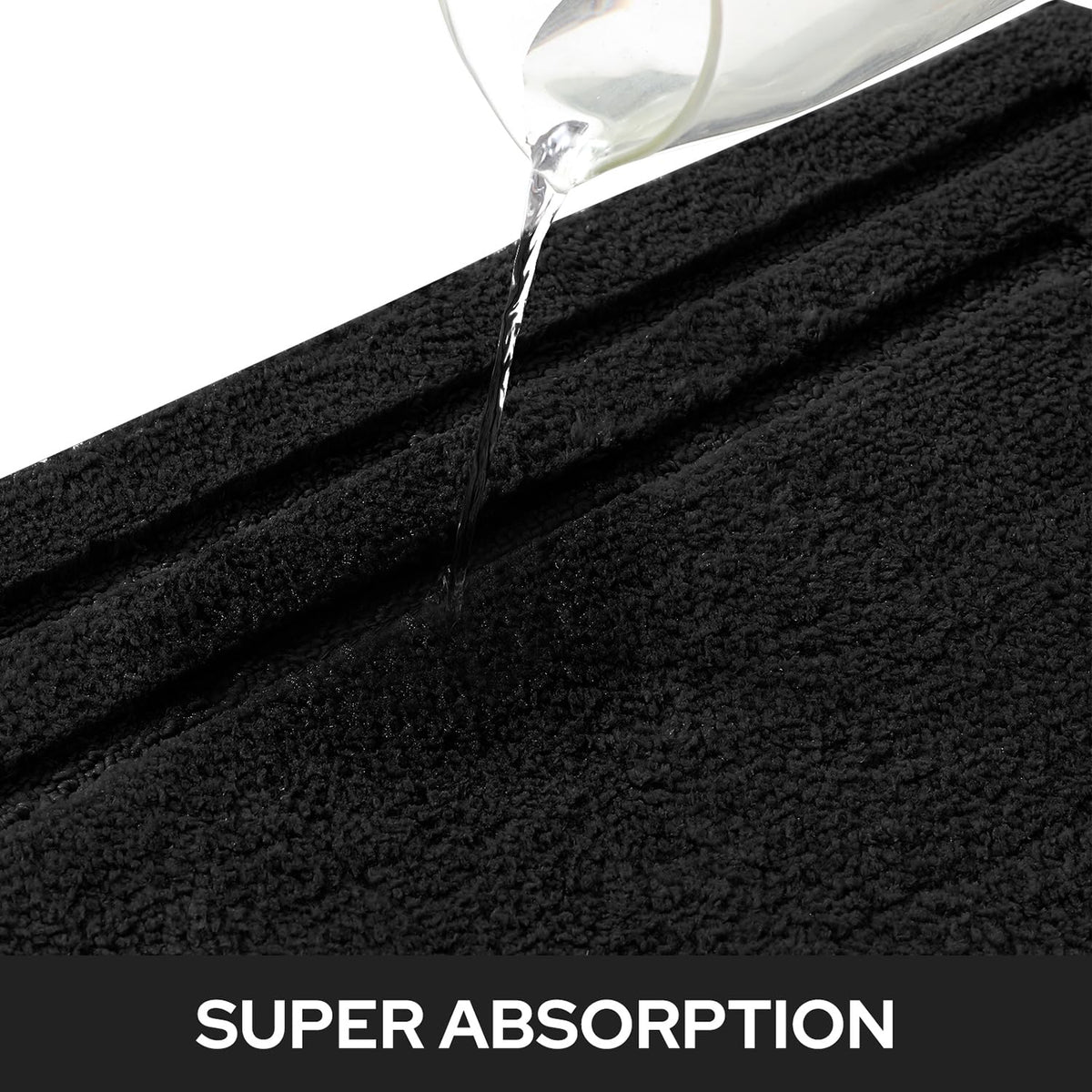 HOMEIDEAS absorbent microfiber mat quickly soaks up moisture after showers.