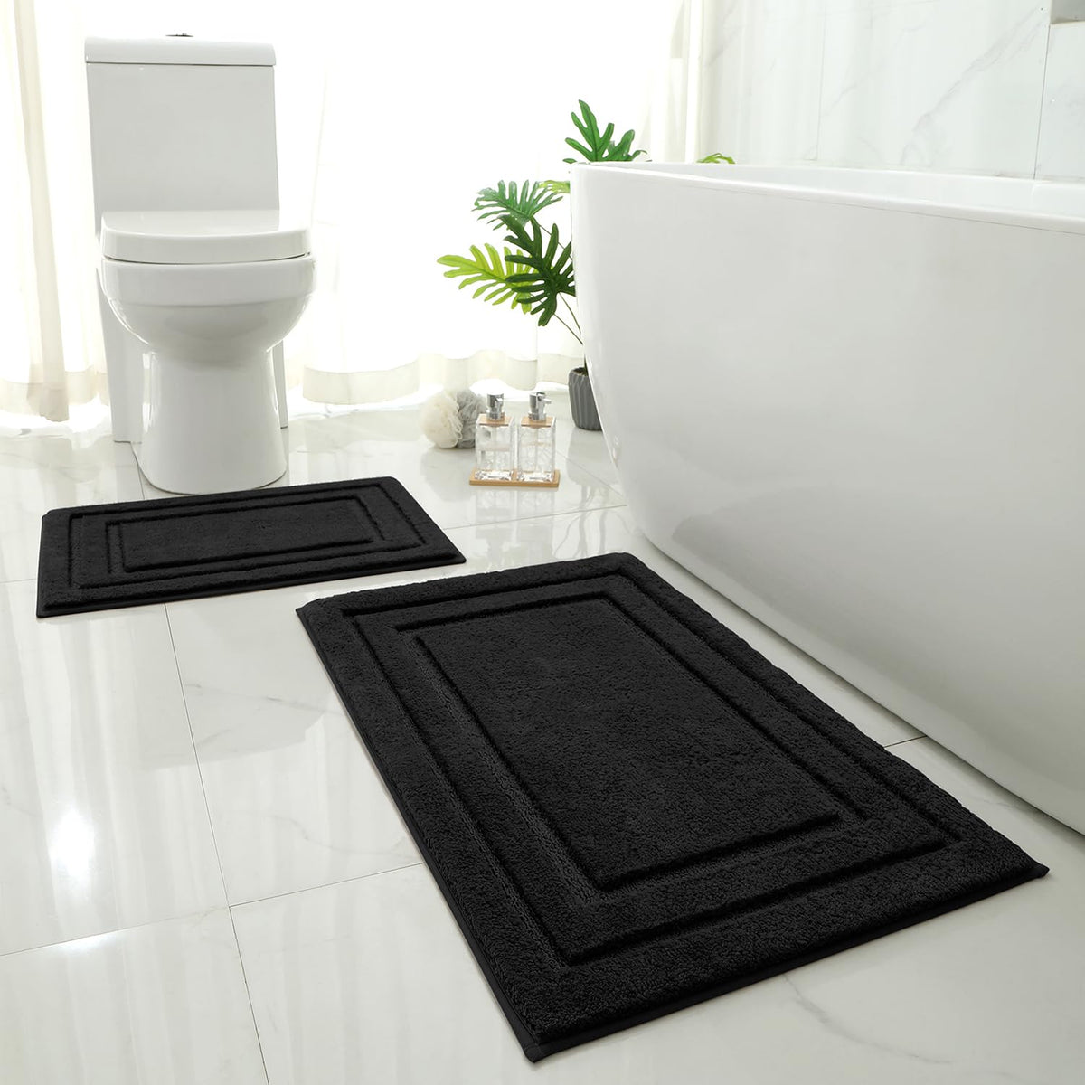 HOMEIDEAS bath rug set with soft-pile texture for warm feet after showers.