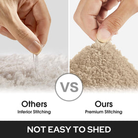HOMEIDEAS beige bath mats laid on a dry bathroom floor.
