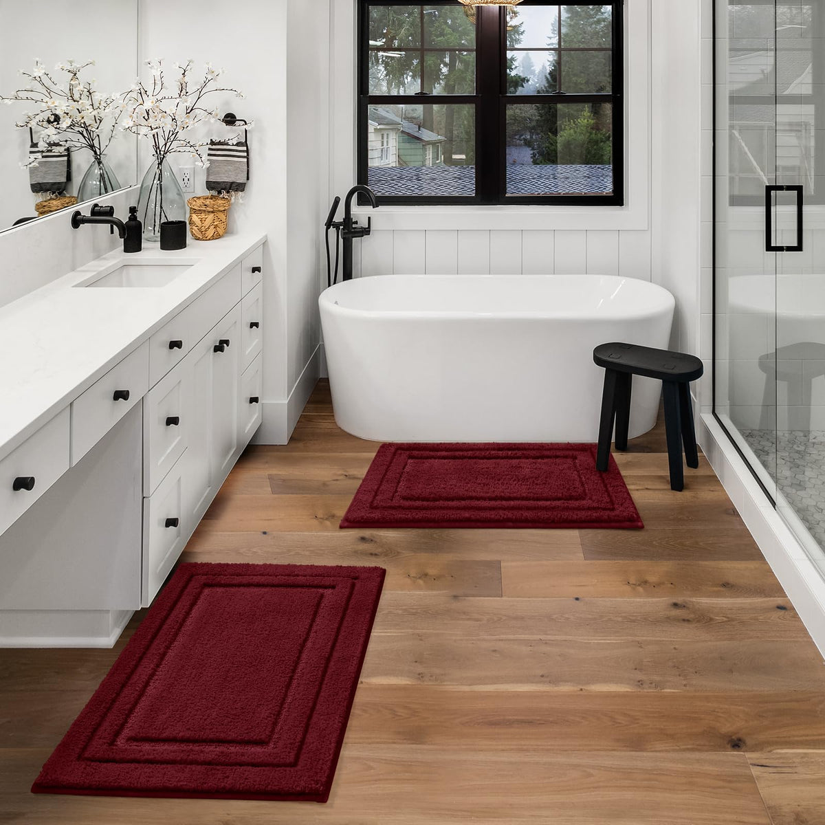 HOMEIDEAS burgundy red decor rug enhances bathroom aesthetics and coordination.