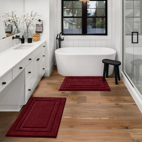 HOMEIDEAS burgundy red decor rug enhances bathroom aesthetics and coordination.