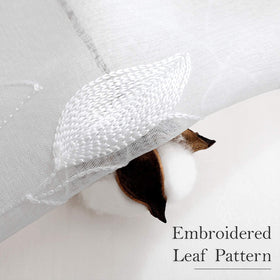 HOMEIDEAS faux linen texture sheer curtains diffuse light while maintaining privacy.