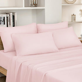 HOMEIDEAS full-size bed sheets in pale pink on a bed for a cozy look