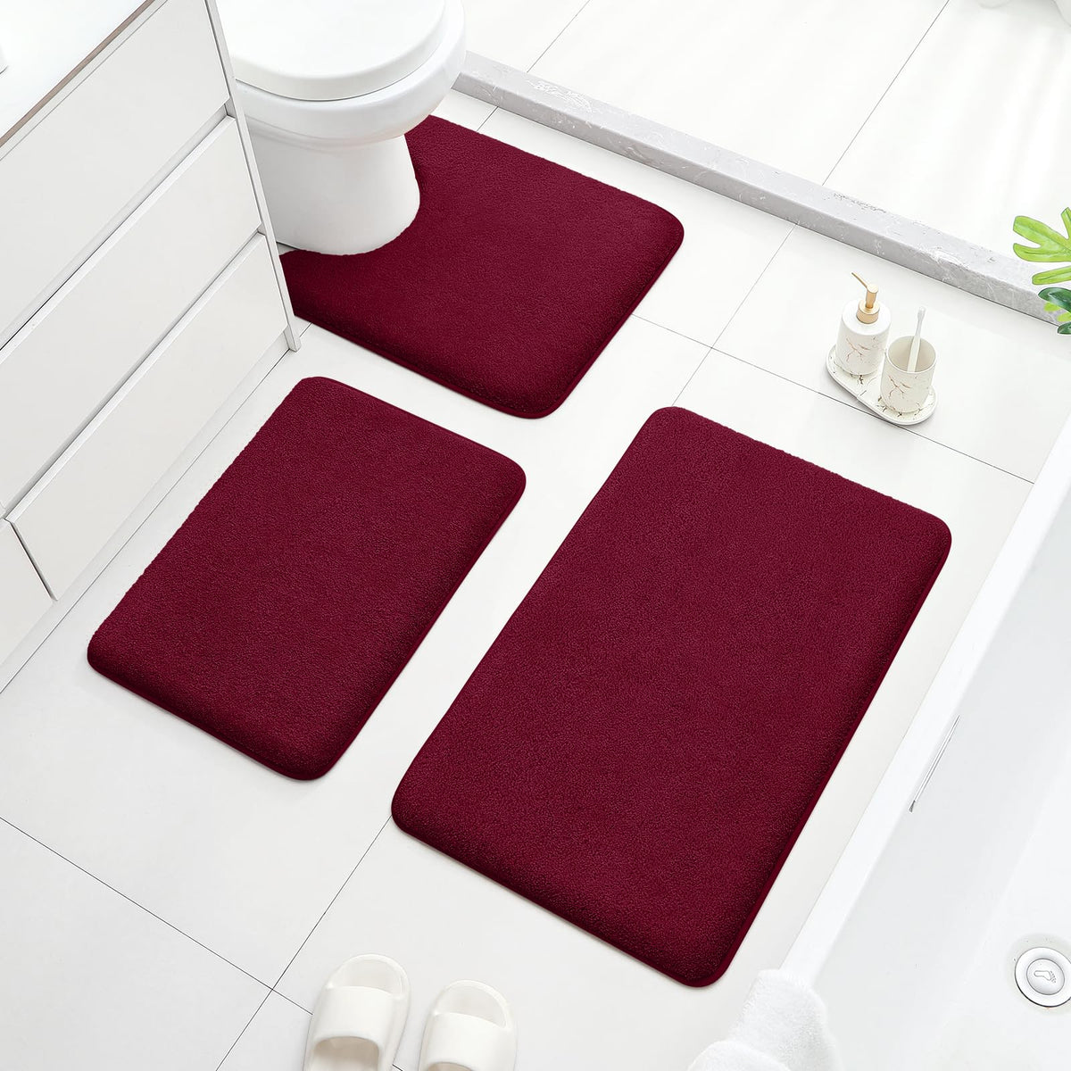 HOMEIDEAS burgundy color adds warm accent to modern bathrooms.
