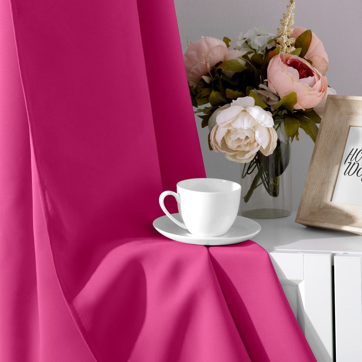 Homeideas Raspberry curtains highlight a stylish grommet design for easy installation.