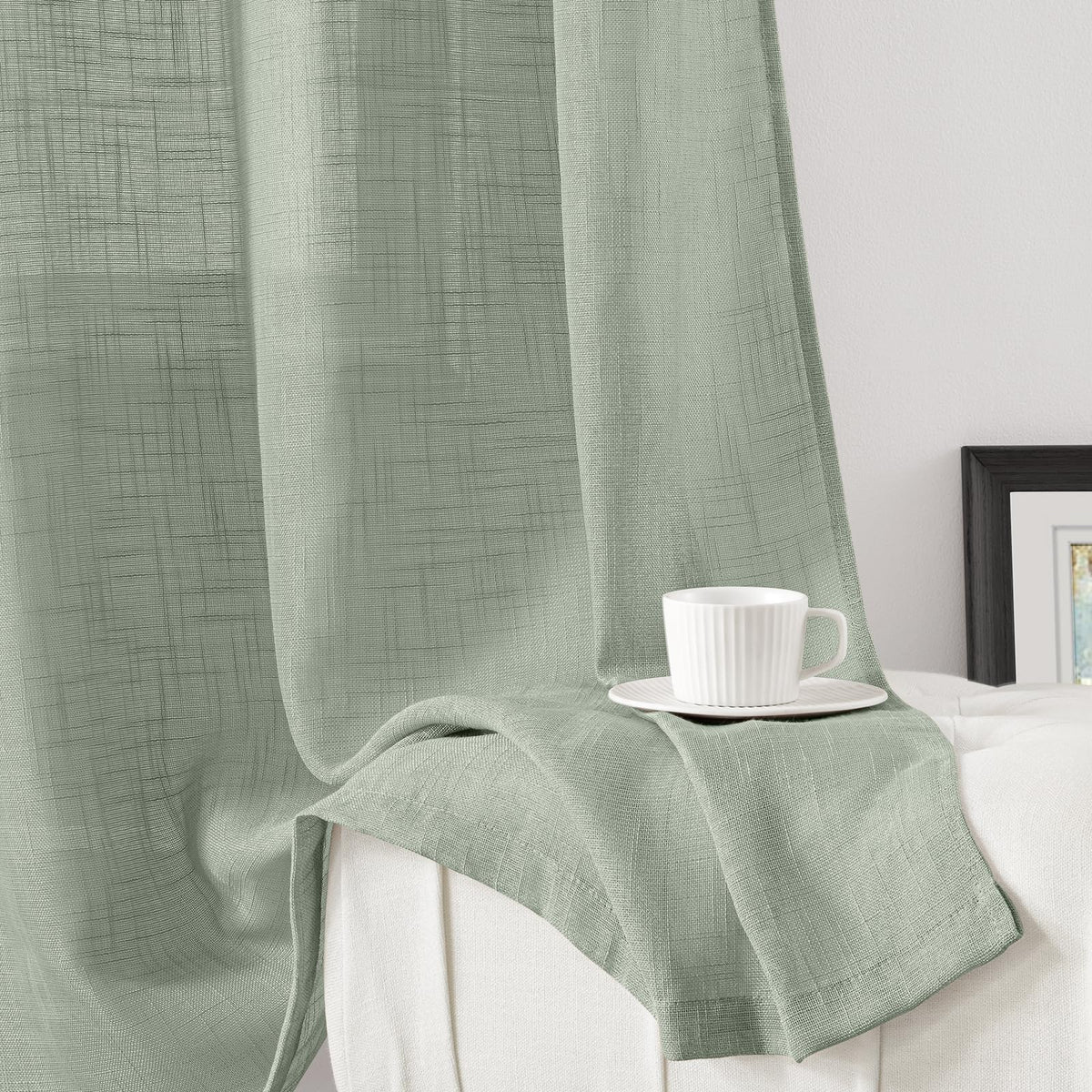 HOMEIDEAS sage green linen-textured sheer curtains on patio doors soften glare.