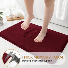 HOMEIDEAS U-shaped rug provides a secure fit around the toilet area.