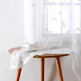 HOMEIDEAS white sheer curtains with embroidered leaf pattern for bright, private living spaces.