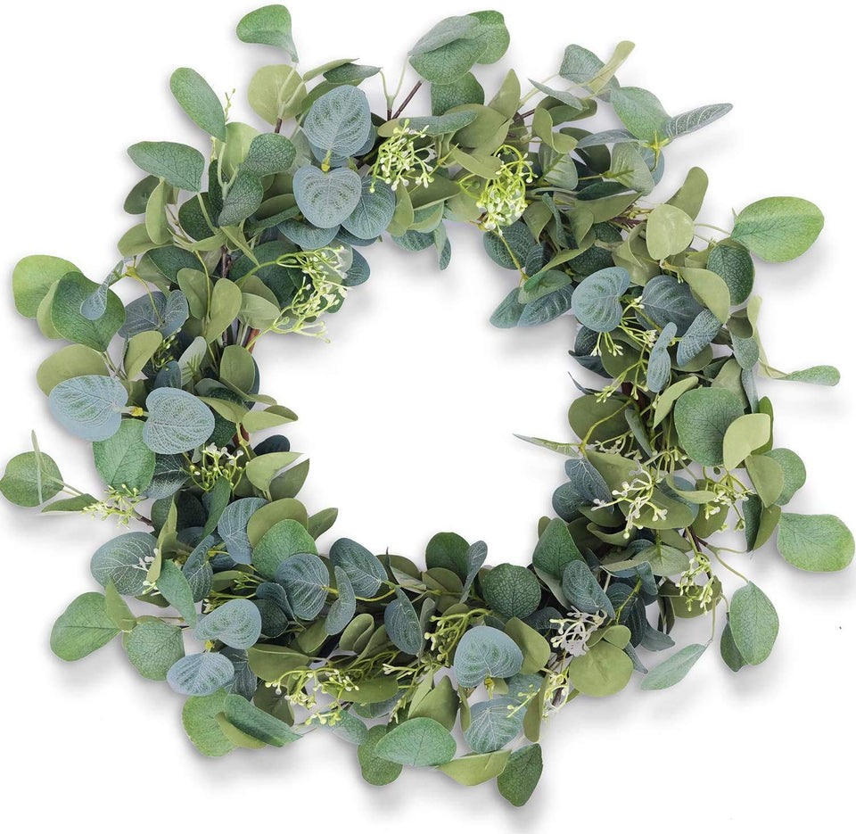 HomeKaren eucalyptus wreath on the front door adds welcoming greenery for all seasons.