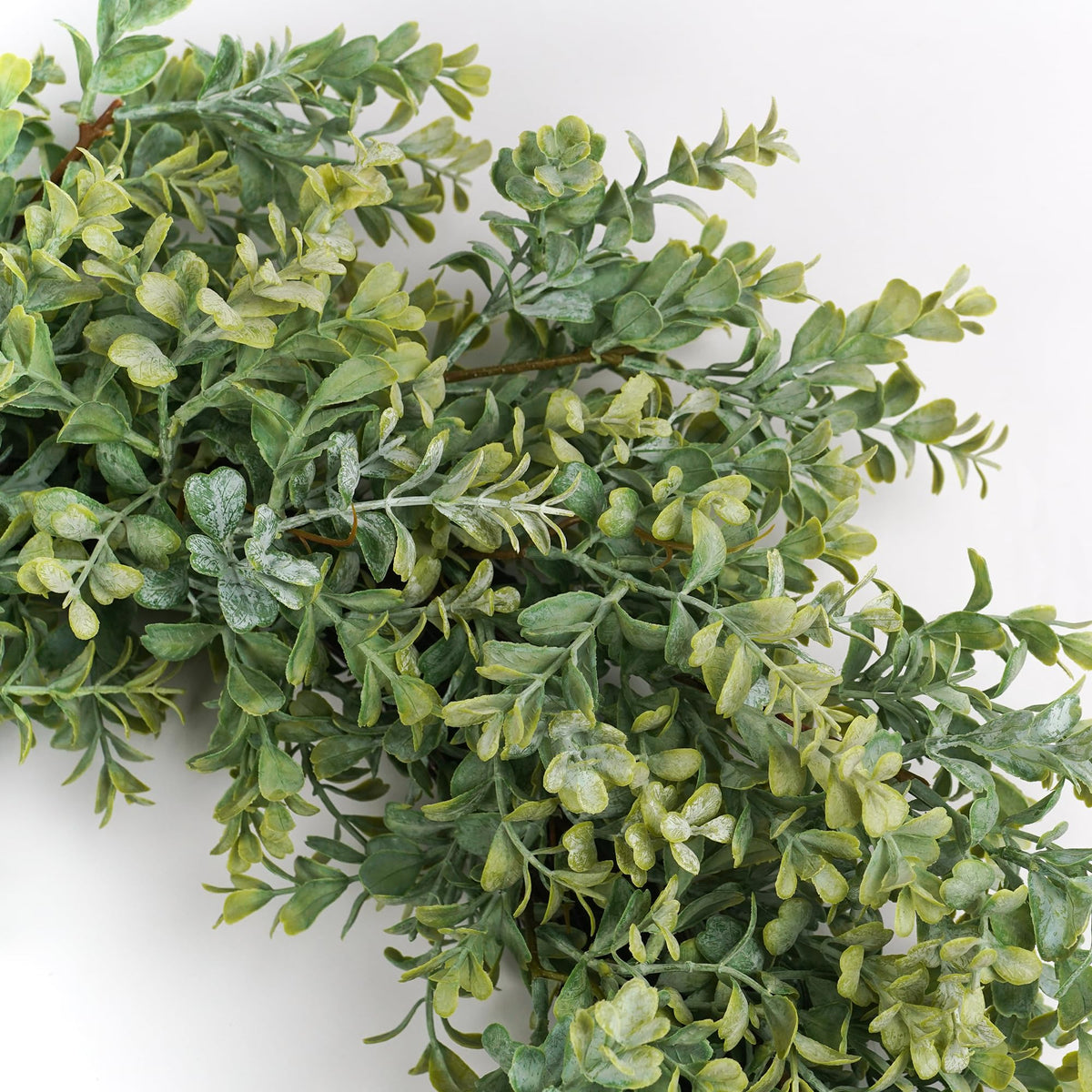 HomeKaren all-season greenery wreath stays bright through spring and summer without daily maintenance.
