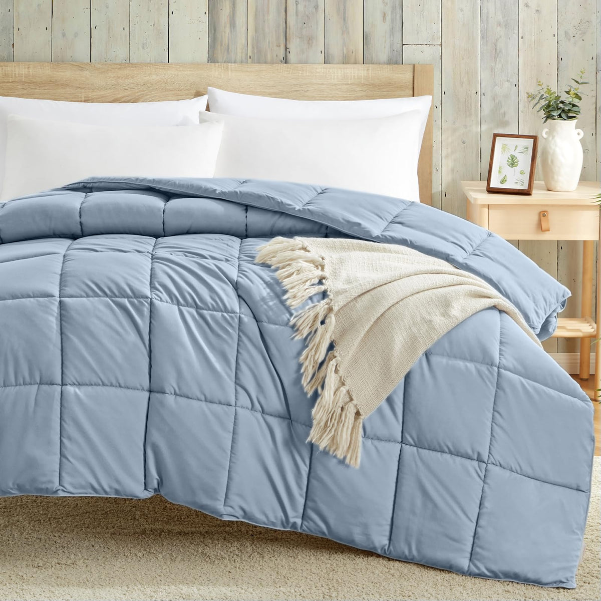 Homelike Moment Comforter lightweight all-season warmth on a bed.