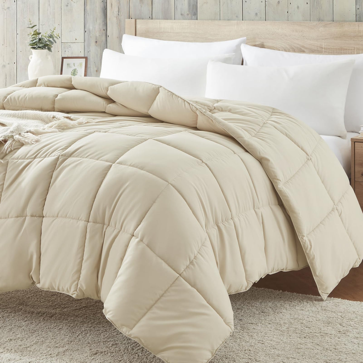 Homelike Moment Comforter folded in beige, lightweight year-round warmth.