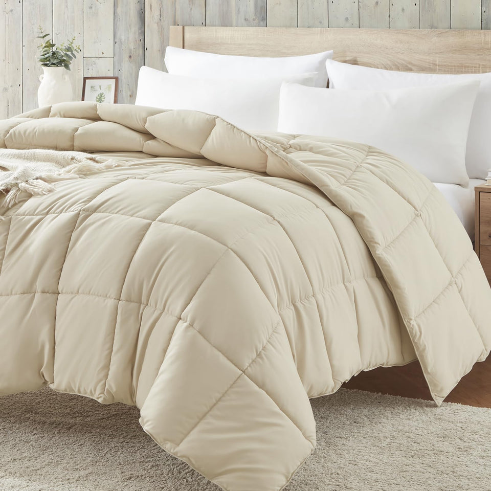 Homelike Moment Comforter folded in beige, lightweight year-round warmth.
