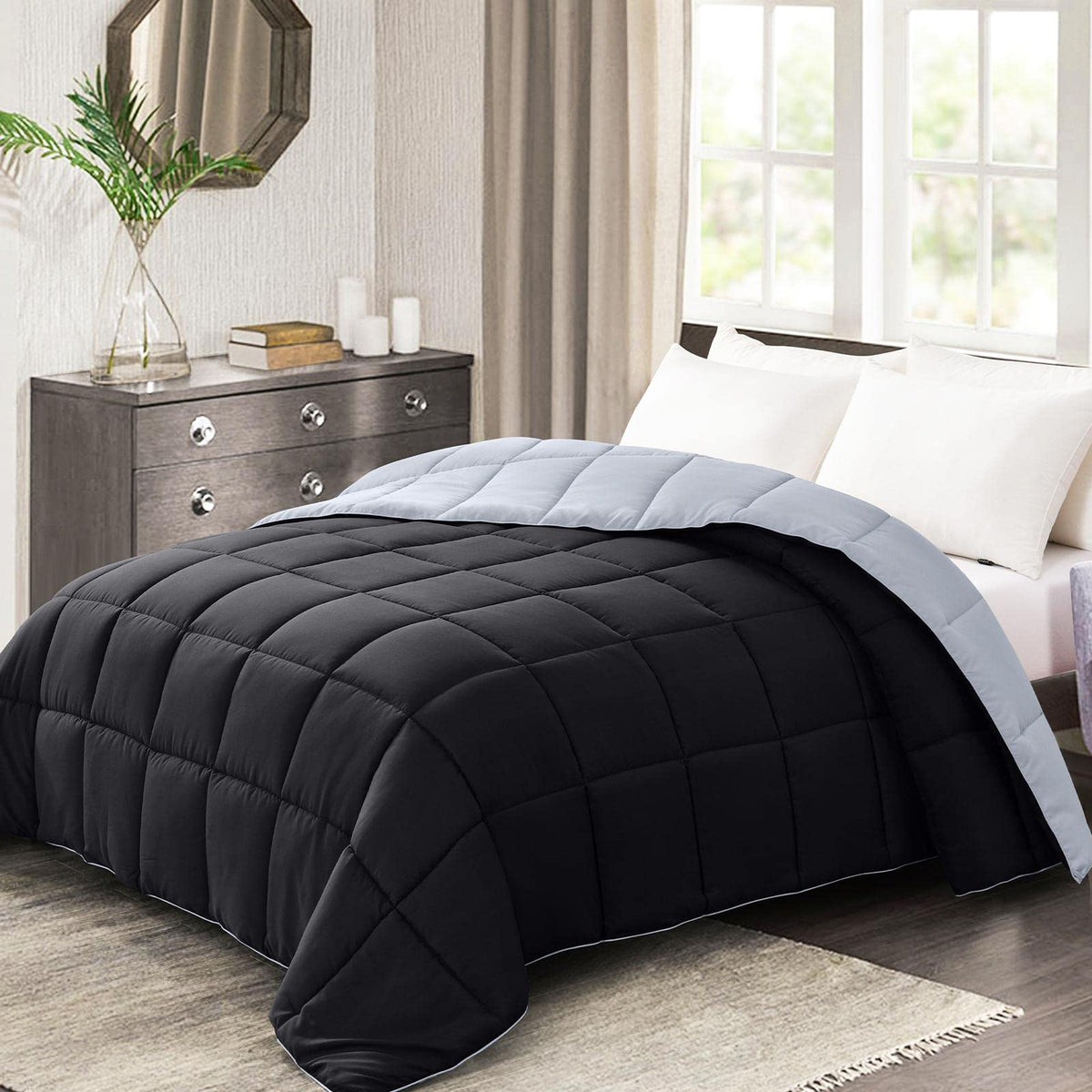 Homelike Moment comforter on bed with reversible black gray design for two looks.