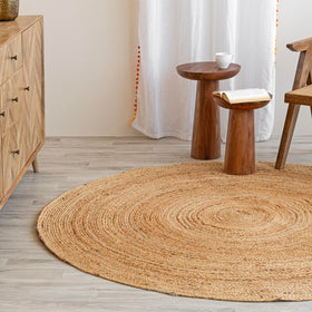 HOMEMONDE natural jute entryway rug withstands foot traffic and guards entryways.