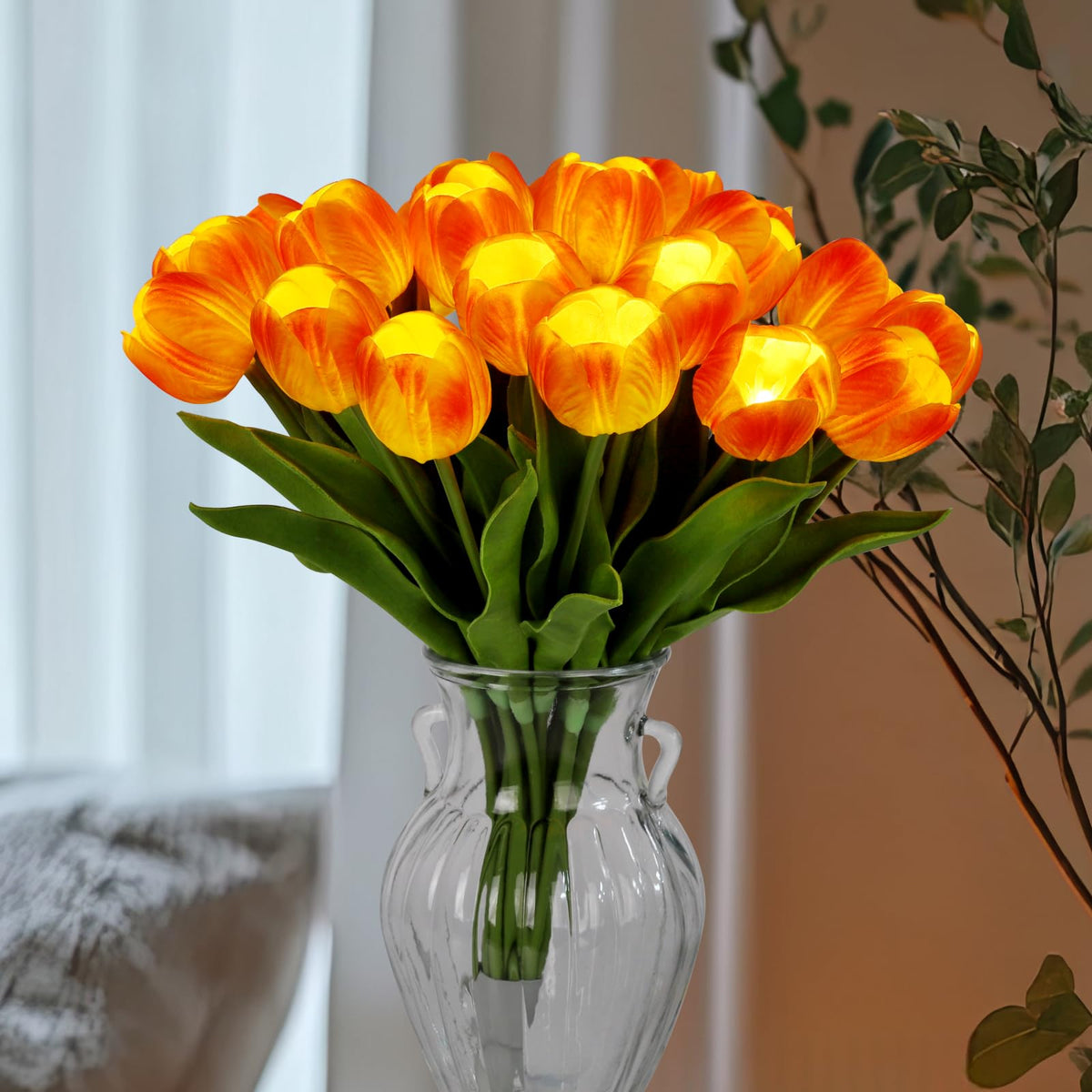 Homeseasons orange tulip light creates warm, romantic ambiance for evenings.