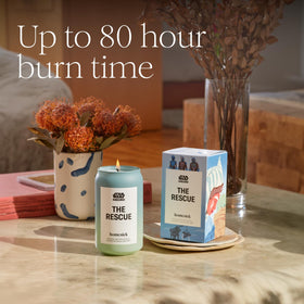 Homesick New Home candle packaging and sleeve showcase brand storytelling.