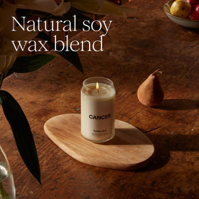 Homesick New Home candle in entryway sets a welcoming mood.