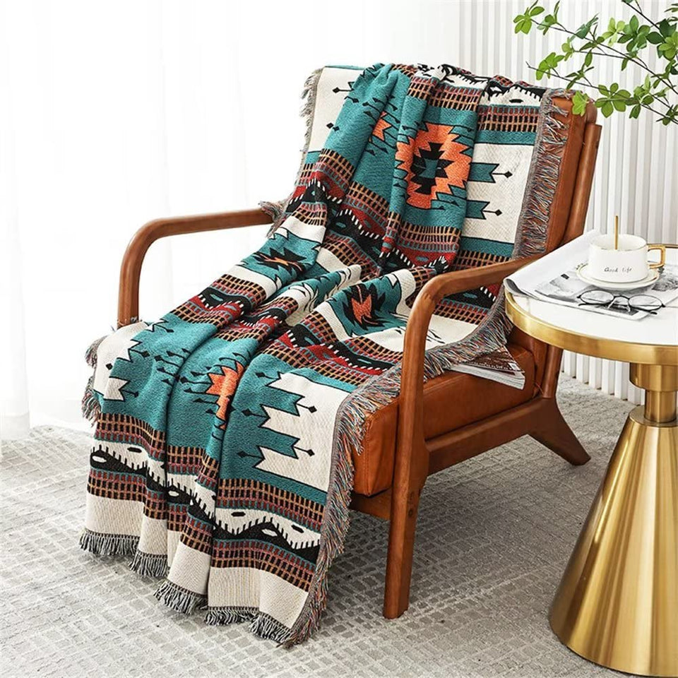 Homesy Boho Throw Blanket in Green Aztec, front view, adds cozy warmth to your sofa