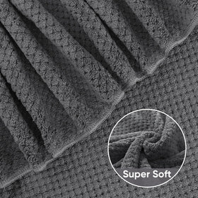 HOMEXCEL microfiber soft-touch towel resting on a bathroom rack.