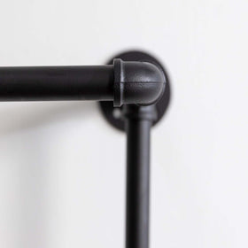 Homeyeeng sturdy 135 lb capacity rack supports garments and accessories confidently.