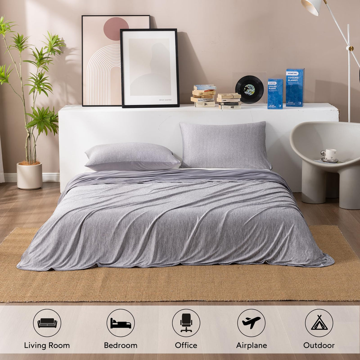 HOMFINE cooling blanket in travel setting, compact for car or plane.