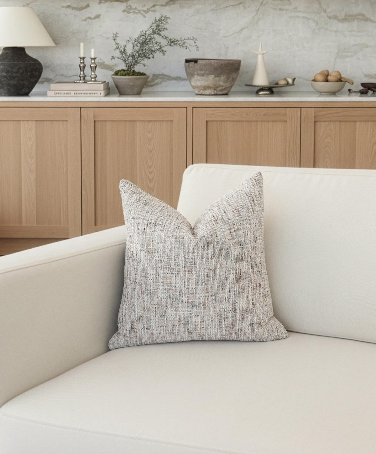 HOMFINER decorative pillow cover on couch; versatile styling for modern living rooms