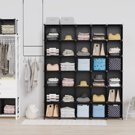 HOMIDEC closet storage cubes organize clothes in a tidy bedroom.