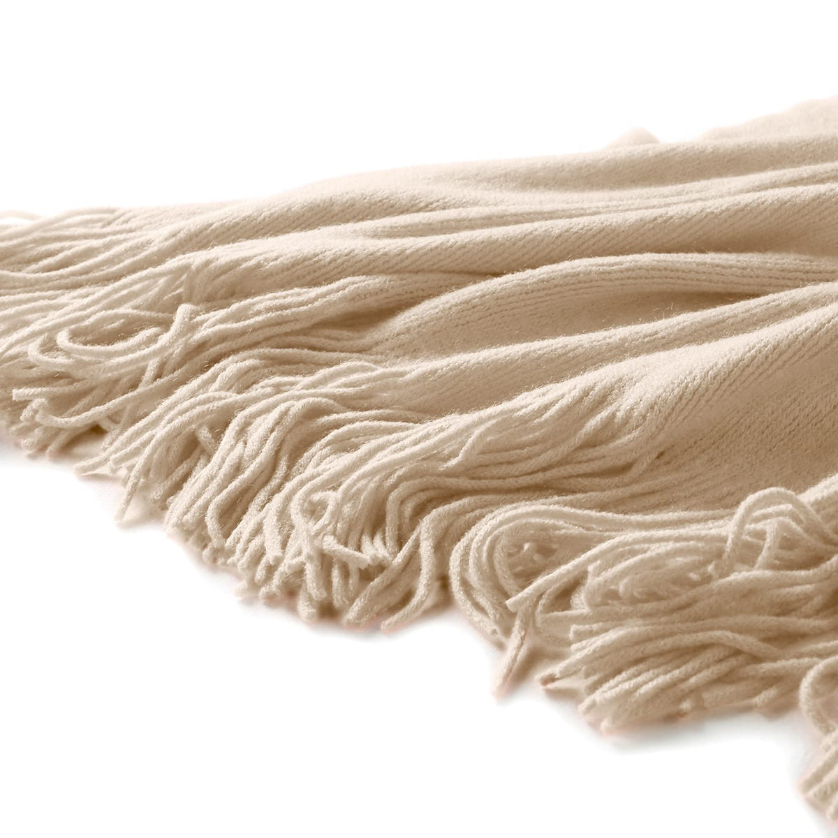 Homiest taupe blanket with fringe complements beds, sofas, and chairs.