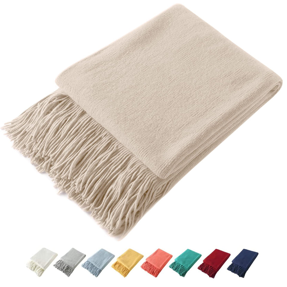 Homiest decorative knitted throw with taupe fringe adds texture to your sofa.