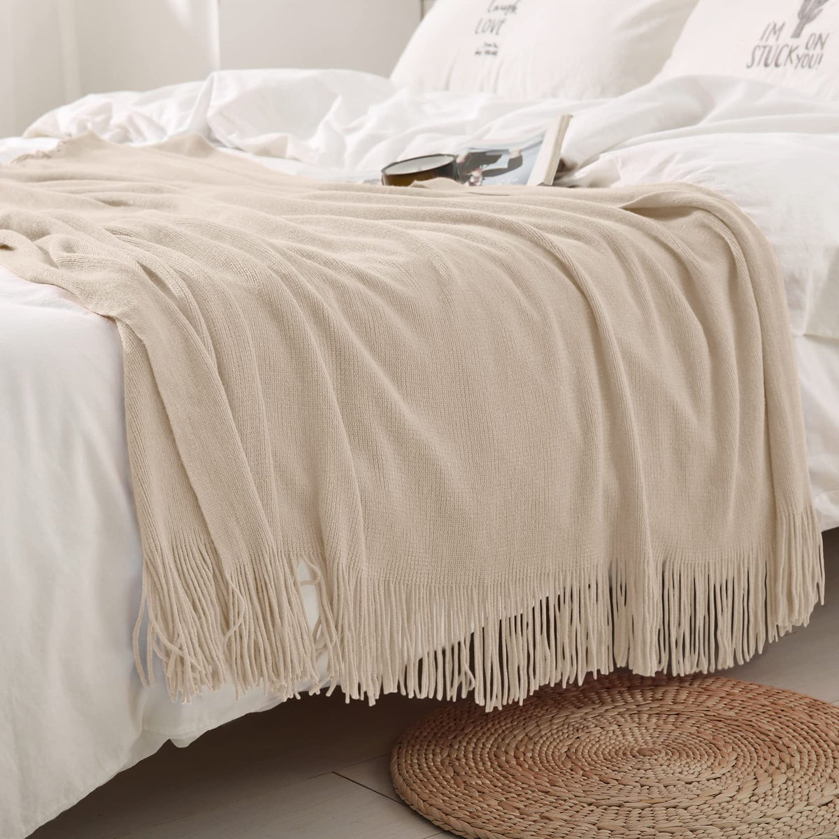 Homiest knit throw fringe detail shows soft acrylic fiber and tassels.