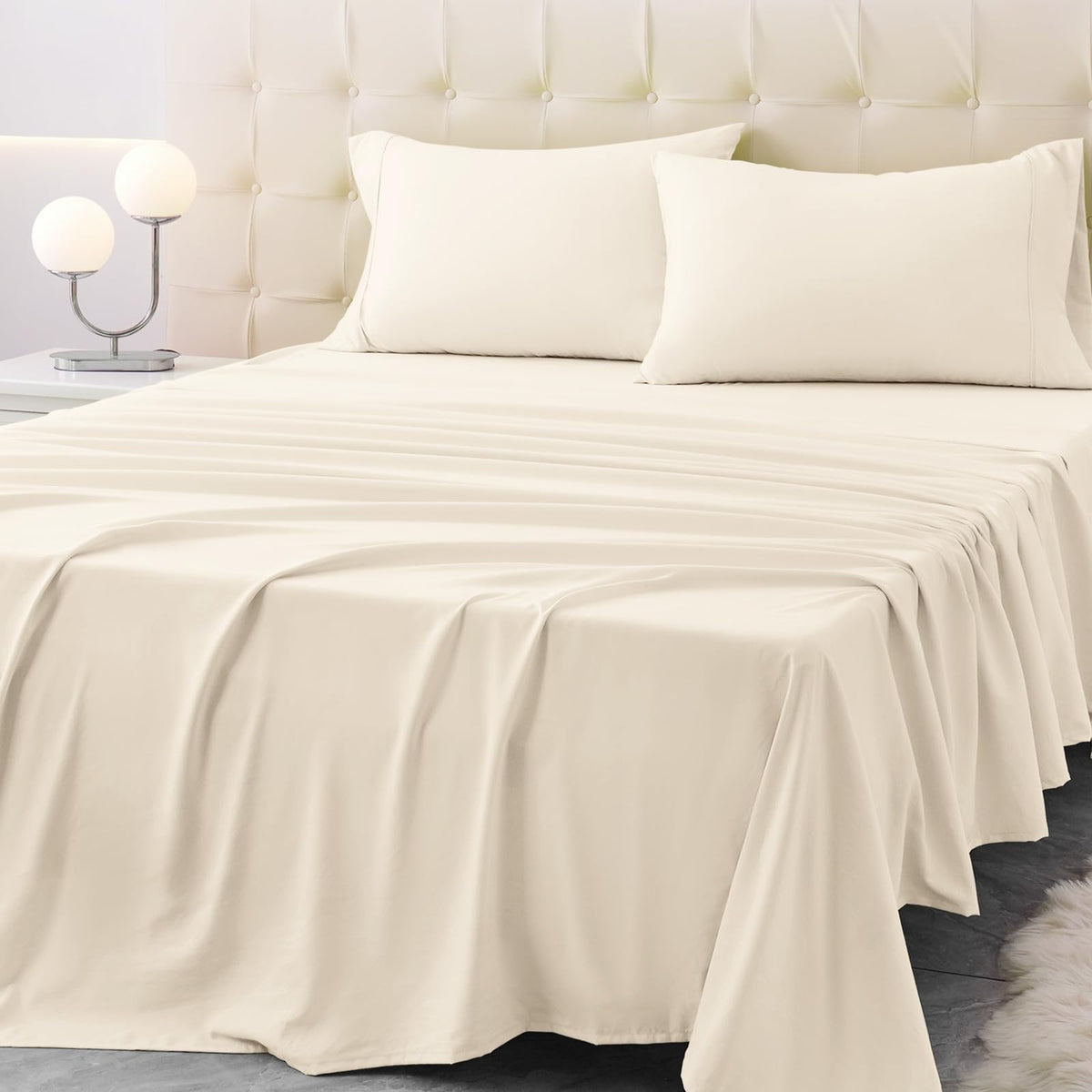 Homilay king-size flat sheet showing soft, silky microfiber feel for a cooler night