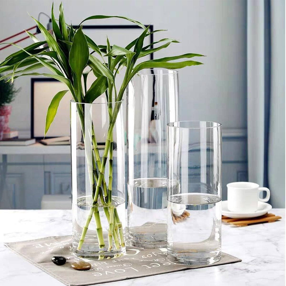 Homjoy 24-pack cylinder vases ideal for weddings and home decor.