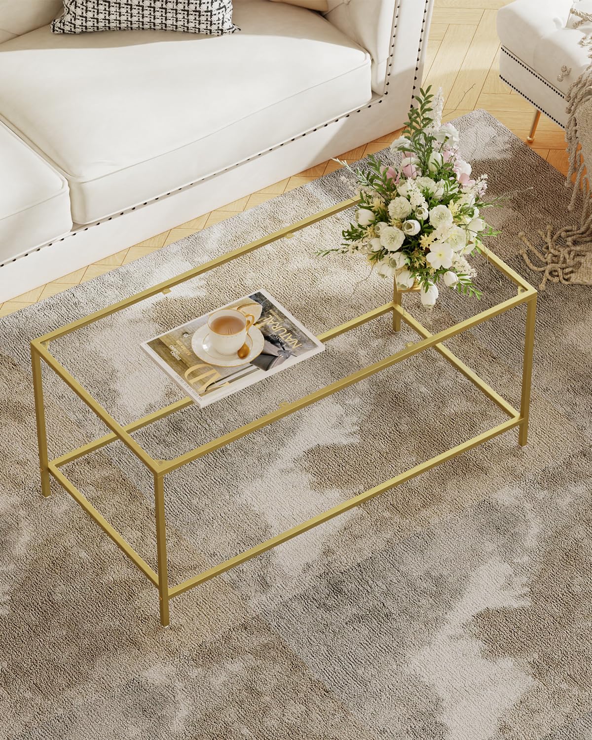 Homleke glass coffee table with golden frame, front view, ideal living room centerpiece