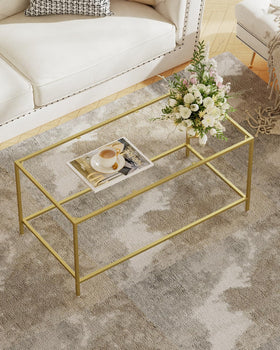Homleke glass coffee table with golden frame, front view, ideal living room centerpiece