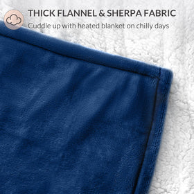 Navy HOMLYNS LuxeHeat blanket draped to evoke couch-side warmth