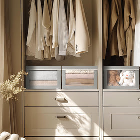 Homsorout storage bins with lids keep out-of-season clothes clean.