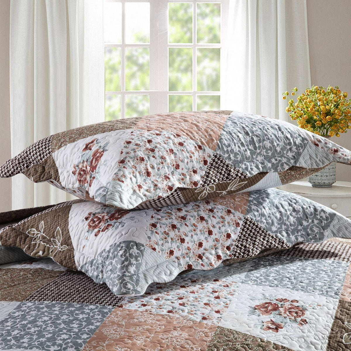 HoneiLife oversized king quilt on a bed demonstrates full coverage.