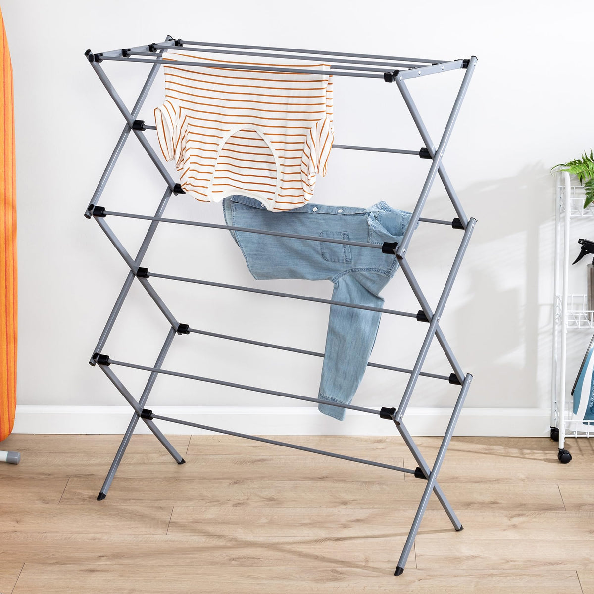 Honey-Can-Do folding drying rack shown folded for compact storage.