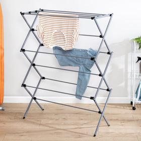 Honey-Can-Do folding drying rack shown folded for compact storage.