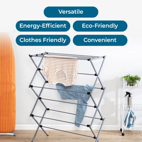 Honey-Can-Do drying rack indoors in a tidy laundry room setup.